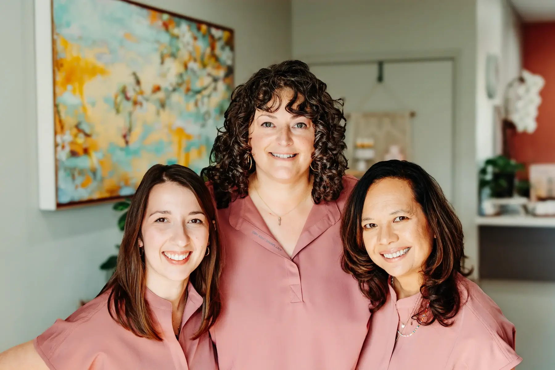 Massage therapists pose at Concept Wellness.